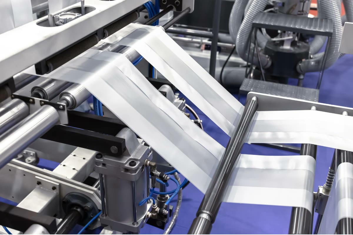 Plastic film running through a production machine